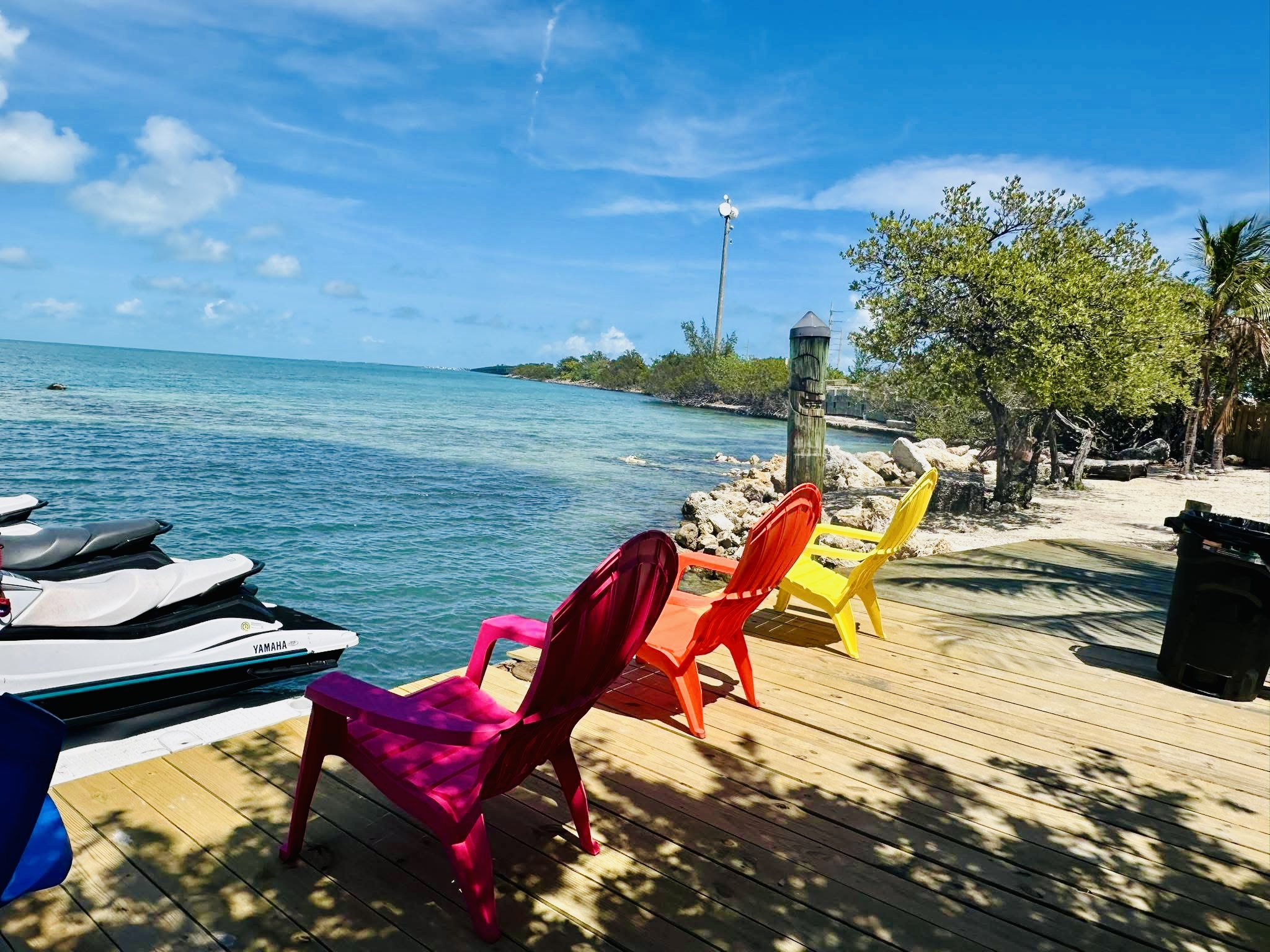 Premium jet skis and rental boats docked at Wakezone Watersports - Conch Key marina.